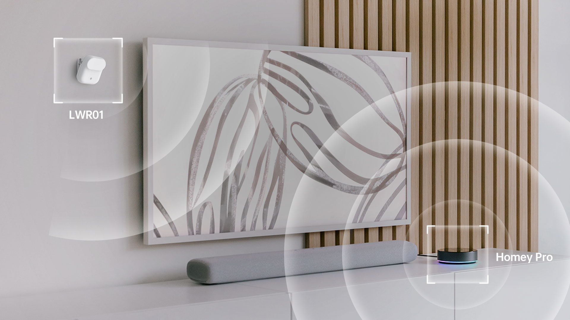 A product shot of the Lafaer LWR01 placed next to a Homey Pro device