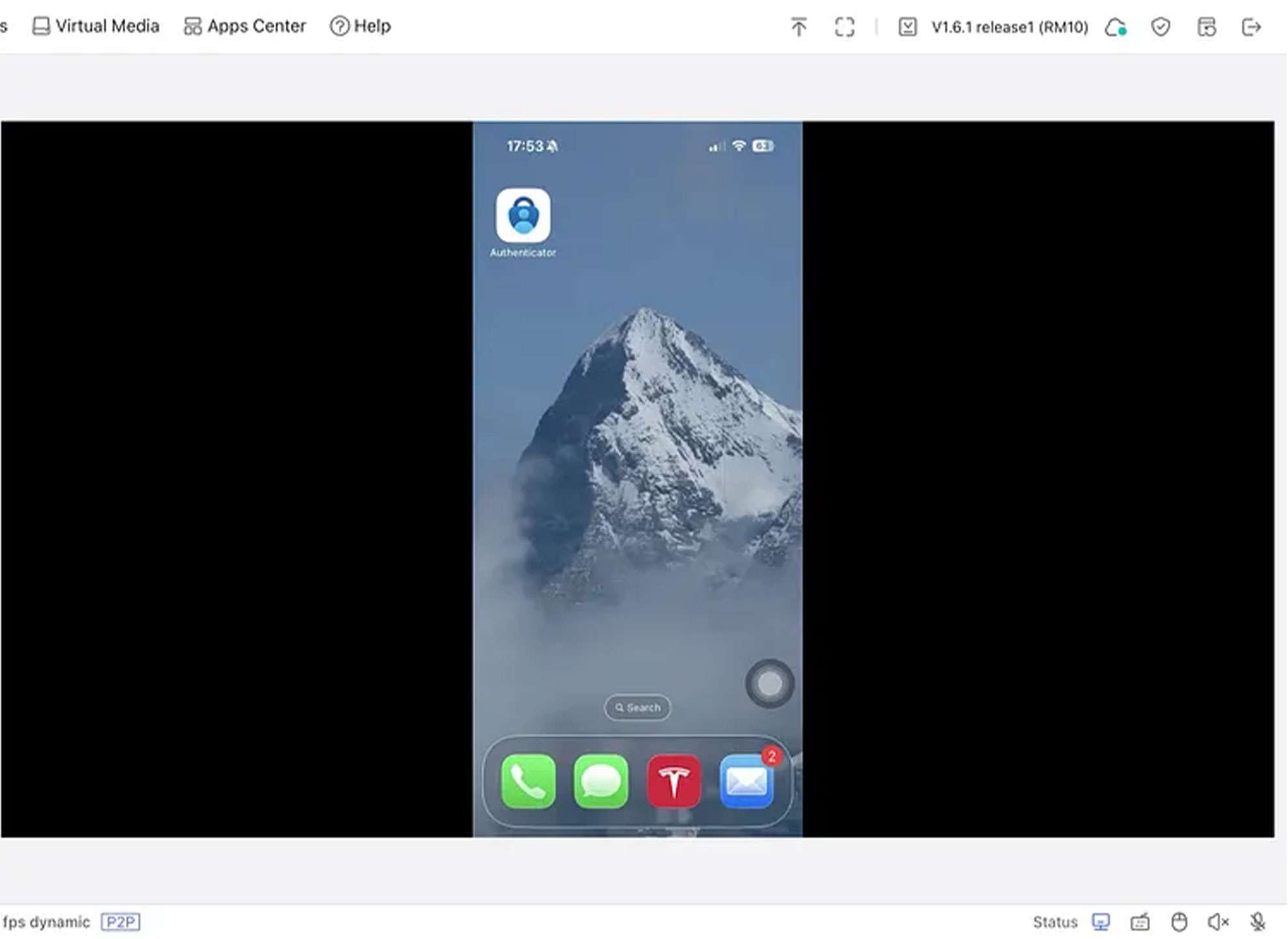 GL KVM website (on laptop) with iPhone under control