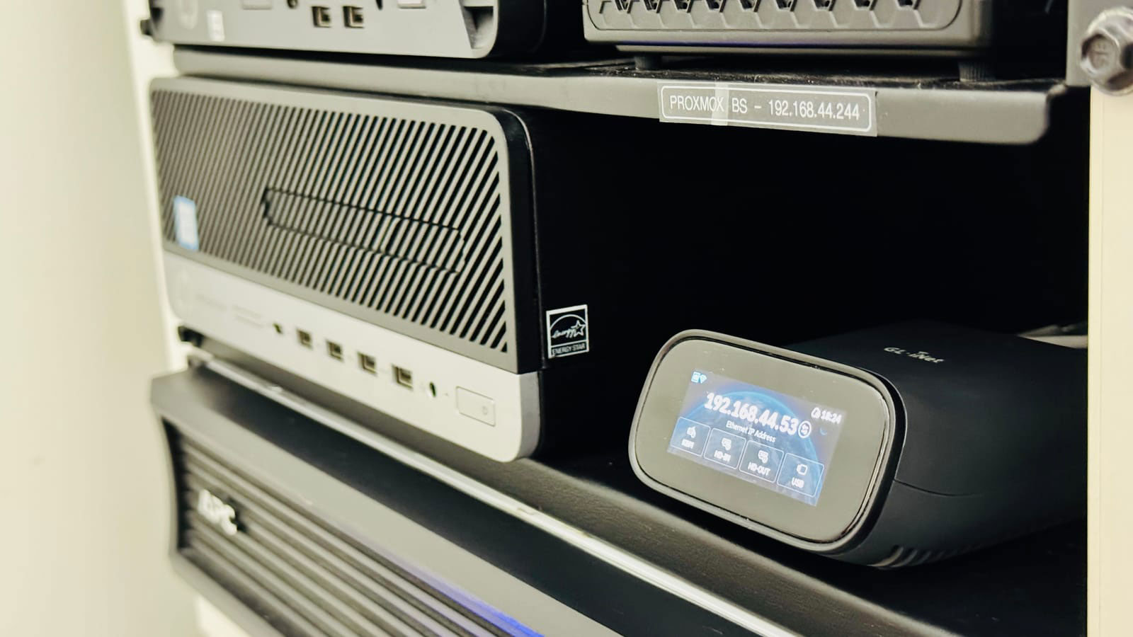 The Comet Pro conveniently setting on the shelving in my ghetto setup homelab.