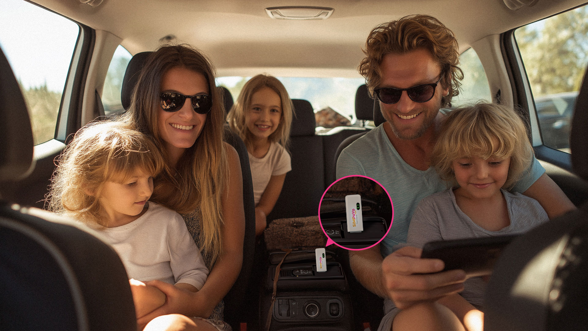 SIMPoYo uFi providing in-car internet during a road trip, plugged into a USB port and supporting passenger devices