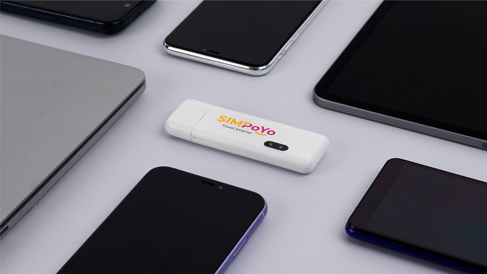 SIMPoYo uFi sharing WiFi with multiple devices including a phone, laptop, and tablet