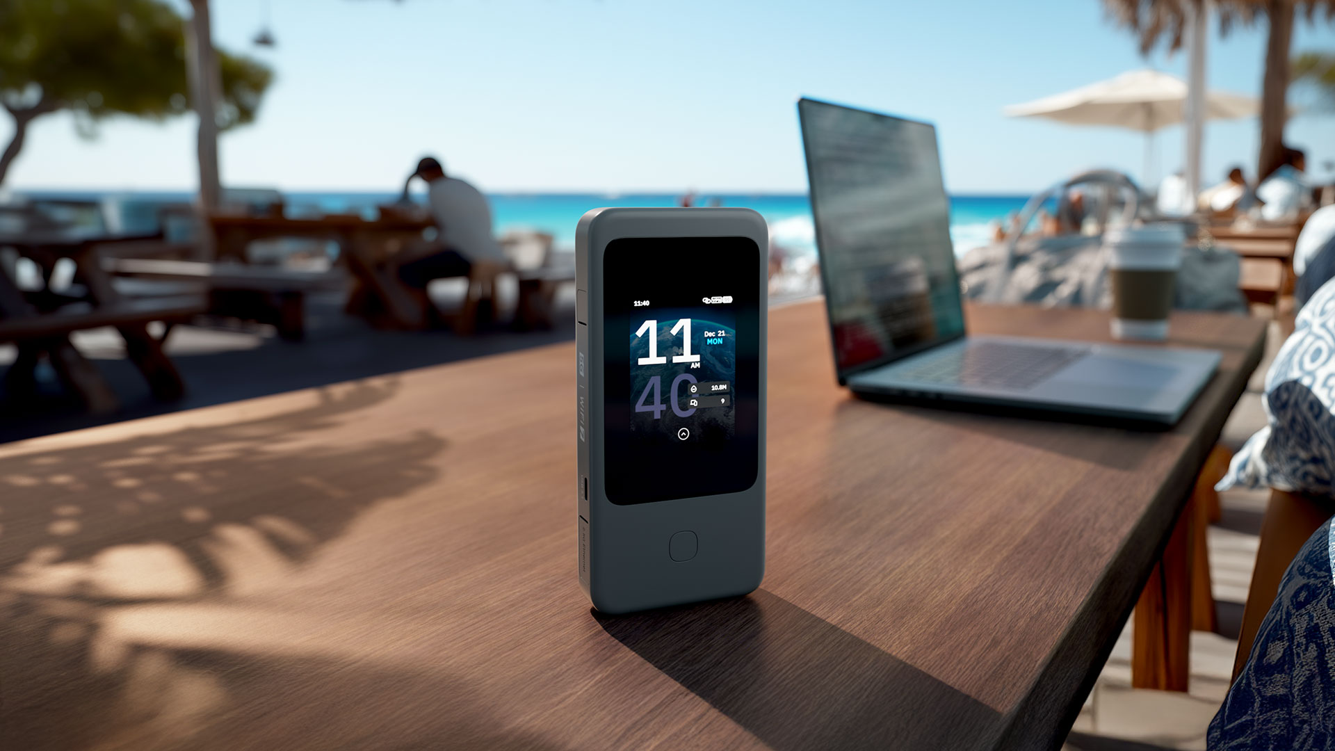 Mudi 7 (GL-E5800) on an outdoor table near a beach